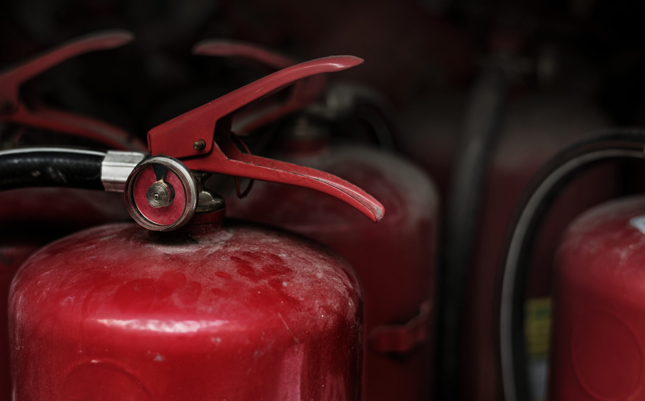 Samruddhi Fire - Closeup of red fire extinguishers